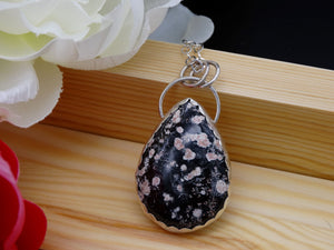 Red Snowflake Obsidian and Silver necklace